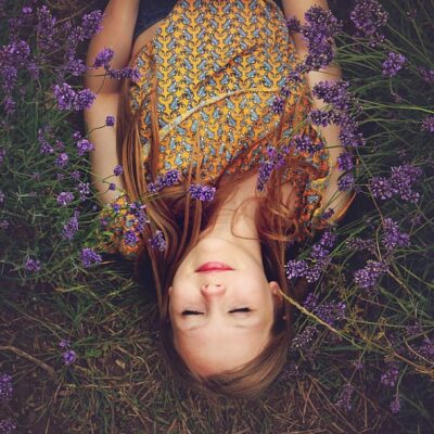 Girl sleeping in lavender field